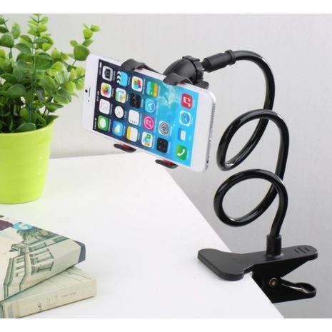 מחזיק הטלפון החכם .על השולחן, ראש המיטה, הכסא, מכונית על גבי קליפס.