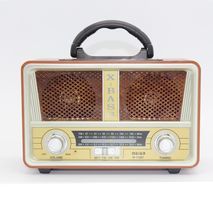 Transistor receiver with USB-input, memory card, MP3, Bluetooth. Powered by electricity, internal batteries and conventional batteries PuXing PX-P10BT