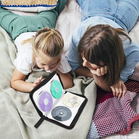 נרתיק אחסון עם רוכסן לדיסקים CD\DVD ל-80 יחידות. ארגונית עם כיסים דו-צדדיים לאחסון ונשיאת דיסקים.