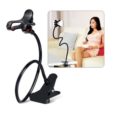 מחזיק הטלפון החכם .על השולחן, ראש המיטה, הכסא, מכונית על גבי קליפס.