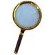 Увеличительное стекло в "золотой" оправе .Диаметр 100 мм